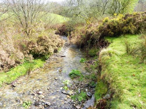 18.-Flowing-near-the-disused-Lynton-Barnstable-track-bed-2