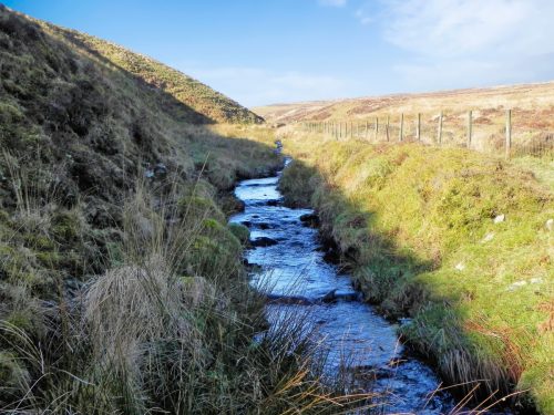 21.-Flowing-below-Hoccombe-Hill-2