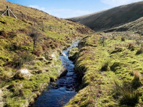 28.-Flowing-below-Hoccombe-Hill-2