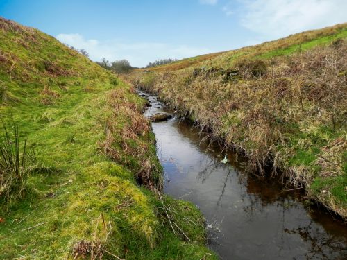 57.-Flowing-below-Twitchen-Ridge-2